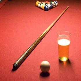 Red Pool Table with Drink